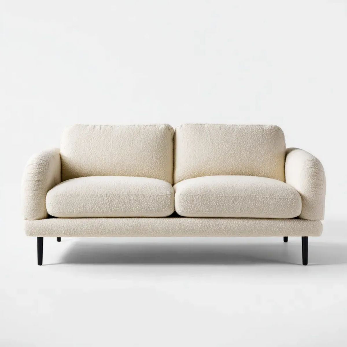 Kremowa sofa dwuosobowa z tkaniny bouclé 160 x 85 x 80 cm z czarnymi metalowymi nogami